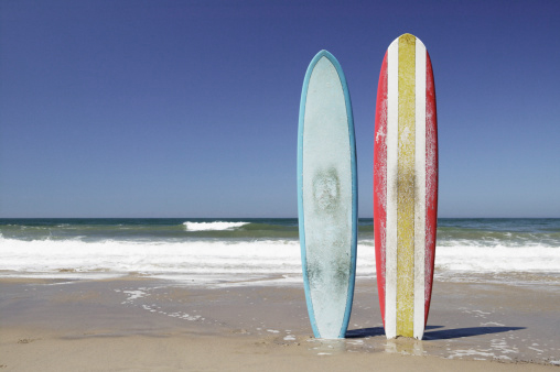 Two Surfboards in Sand